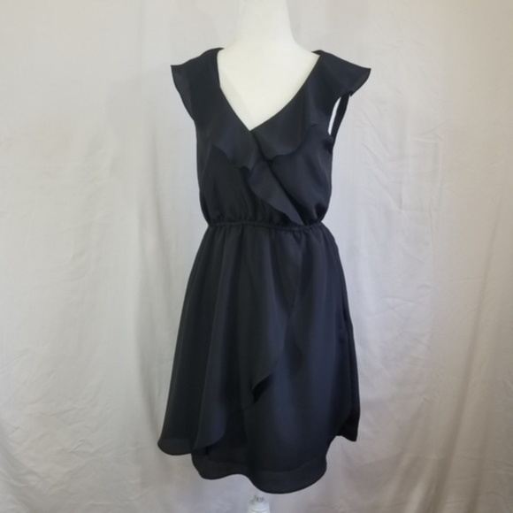 BCBGeneration Dresses & Skirts - BCBGeneration LBD Sleeveless Faux Wrap Black Dress